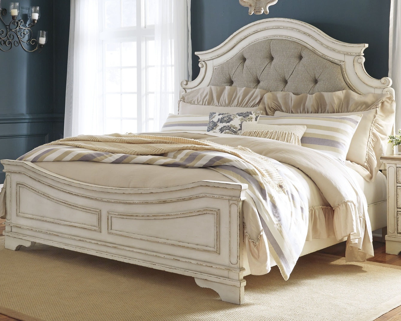 Realyn Upholstered Panel Bed With Mirrored Dresser And Chest