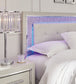 Zyniden Queen Upholstered Panel Headboard with Mirrored Dresser and Nightstand