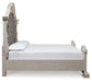 Bruchandi King Upholstered Panel Bed with Mirrored Dresser and Nightstand